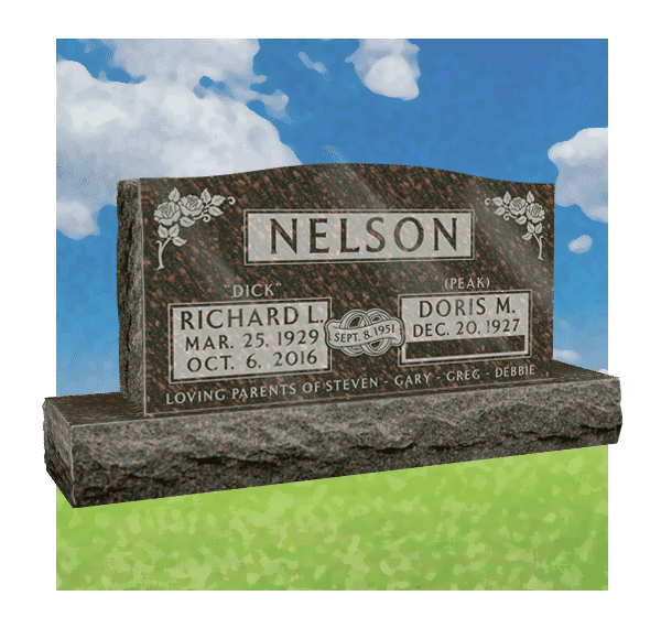 Mahogany granite double upright monument with rose carvings and a wedding ring emblem